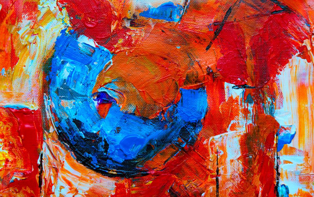 Abstract painting with red, orange, and blue. Credit Steve Johnson.